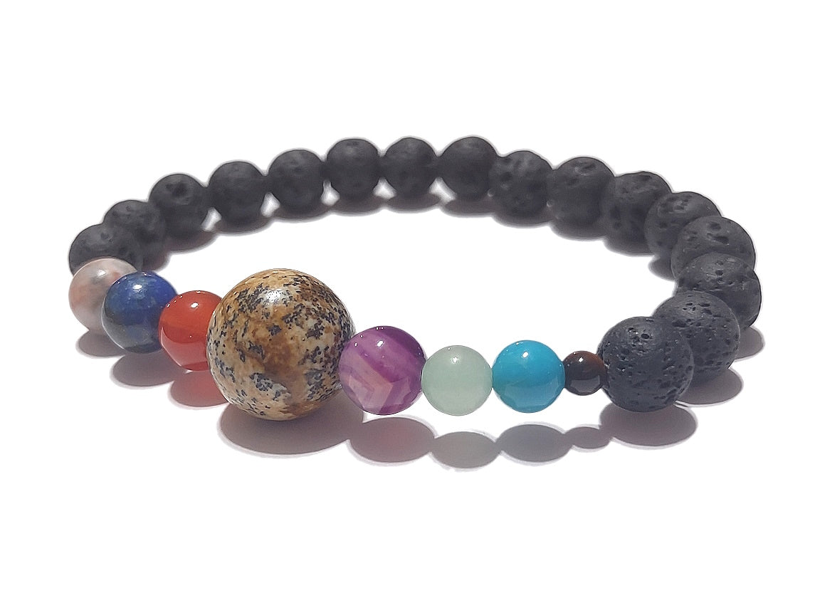A colorful beaded bracelet with different gemstone beads in various sizes, representing the solar system. The rest of the bracelet has coarse black lava stone beads.