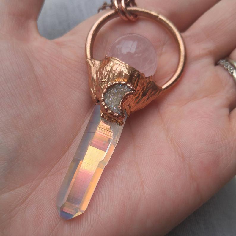 Handmade copper jewelry. Large copper necklace with aura quartz point, drusy aura moon crystal, pink rose quartz sphere, and large round bail. 