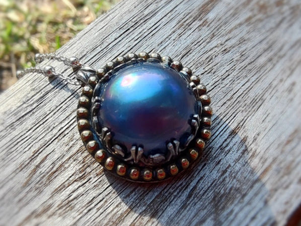 Handcrafted blue mabe pearl neckalace.