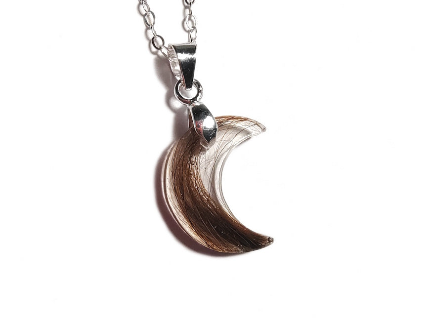 Pet memorial necklace in moon shape on sterling chain.