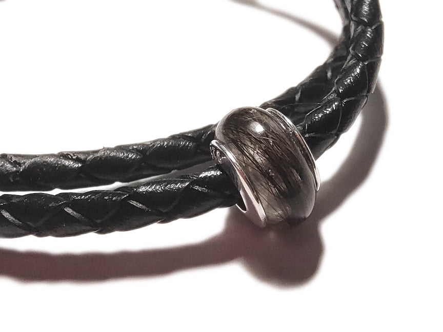 Pet memorial bead on black leather corded bracelet.