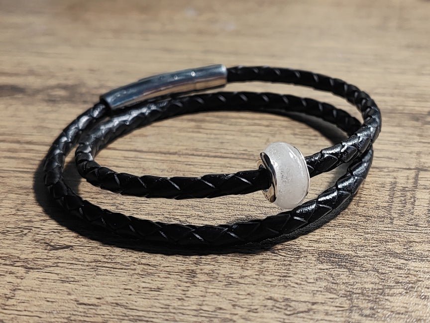 Pet memorial bead on black leather corded bracelet.