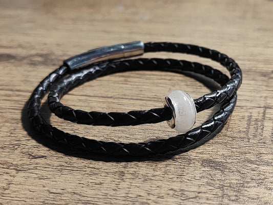 Pet memorial bead on black leather corded bracelet.
