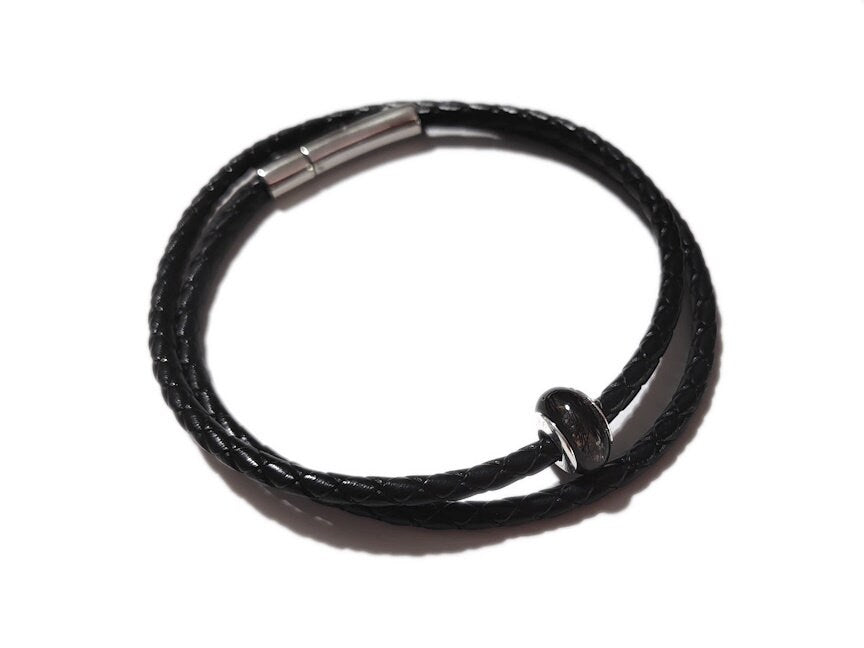 mens style braided bracelet with handmade keepsake bead with sterling rivets.
