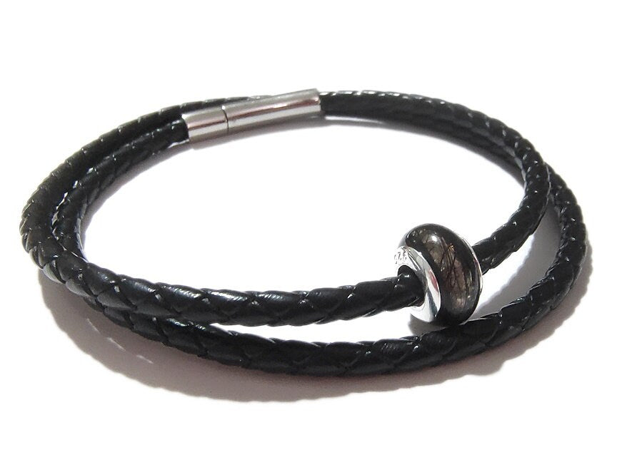 mens style braided bracelet with handmade keepsake bead with sterling rivets.