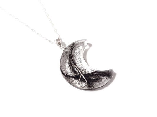 Handcrafted moon shaped memorial necklace with loved ones hair lock