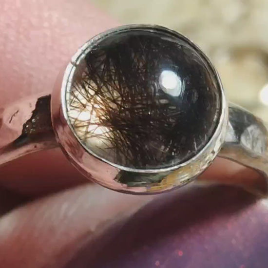 Video shows a hair locket keepsake ring creation montage, from wires and solder to a finished memorial ring.