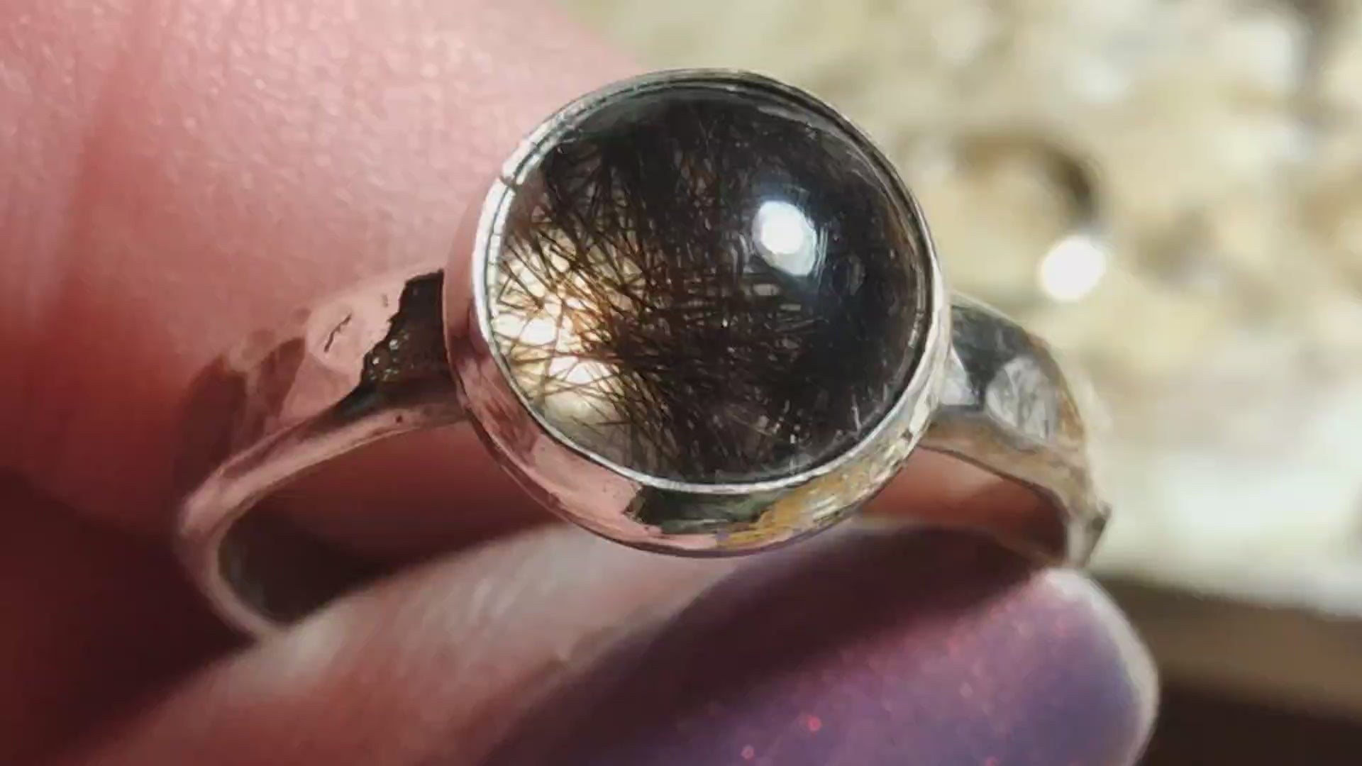 Video shows a hair locket keepsake ring creation montage, from wires and solder to a finished memorial ring.