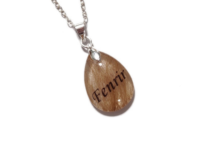 Resin pendant with 'Fenrir' name and pet fur on a silver chain against a white background