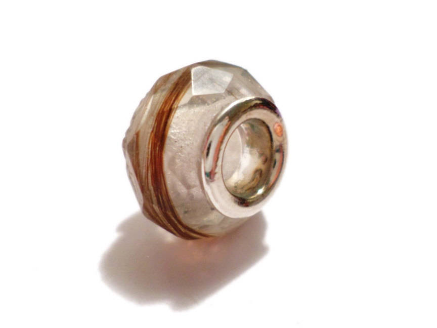 Close up of a faceted bead